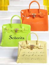Load image into Gallery viewer, Personalized Beachkin tote bags in orange, lime green, and cream with lock details and stylish designs