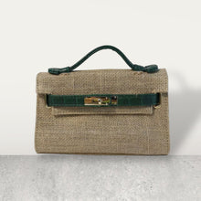 Load image into Gallery viewer, Travellers Hat Boutique wholesale jute clutch bags with green handle and gold clasp detail