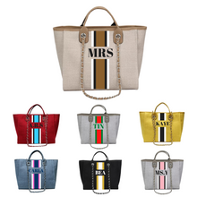 Load image into Gallery viewer, Collection of custom monogram tote bags from Travellers Hat Boutique in various colors with personalized initials