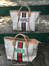 Load image into Gallery viewer, Travellers Hat Boutique custom monogram tote bag featuring beige fabric and personalized embroidered initials