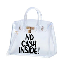 Carregar imagem no visualizador da galeria, Clear personalized Beachkin tote bag from Travellers Hat Boutique with no cash inside print and lock detail
