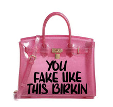 Carregar imagem no visualizador da galeria, Pink transparent personalized Beachkin tote bag with black text and gold lock from Travellers Hat Boutique
