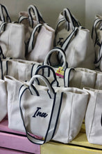 Lataa kuva Galleria-katseluun, Embroidered boat tote bag with navy handles and personalized name embroidery by Travellers Hat Boutique

