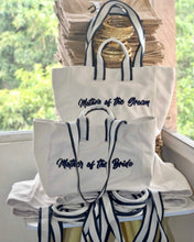 Lataa kuva Galleria-katseluun, Travellers Hat Boutique embroidered boat tote bag with Mother of the Bride and Mother of the Groom text
