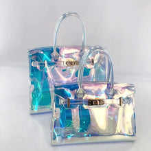Load image into Gallery viewer, Travellers Hat Boutique holographic clear tote bag with iridescent finish and metallic handles
