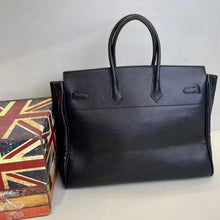 Charger l&#39;image dans la galerie, Black leather men&#39;s multipocket travel bag tote with sturdy handles from Travellers Hat Boutique
