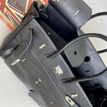 Charger l&#39;image dans la galerie, Black men&#39;s multipocket travel bag tote by Travellers Hat Boutique with multiple compartments and sturdy handles
