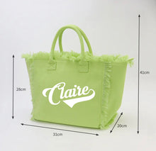 Lade das Bild in den Galerie-Viewer, Personalized canvas tote with fringe in lime green featuring custom name Claire and dimensions
