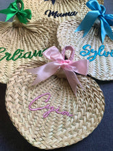 Load image into Gallery viewer, Personalized embroidered abaniko fan with colorful bows and custom names in woven straw design
