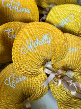 Load image into Gallery viewer, Personalized embroidered abaniko fan in woven straw with white script names and ribbon ties
