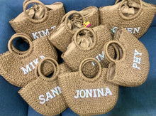 Load image into Gallery viewer, Personalized straw beach bag totes with round handles and custom white name embroidery by Travellers Hat Boutique
