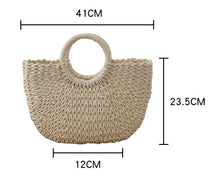 Load image into Gallery viewer, Personalized straw beach bag from Travellers Hat Boutique with round handles and woven design
