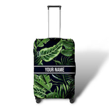 Load image into Gallery viewer, Travel luggage cover with name in green tropical leaf design on a suitcase by Travellers Hat Boutique
