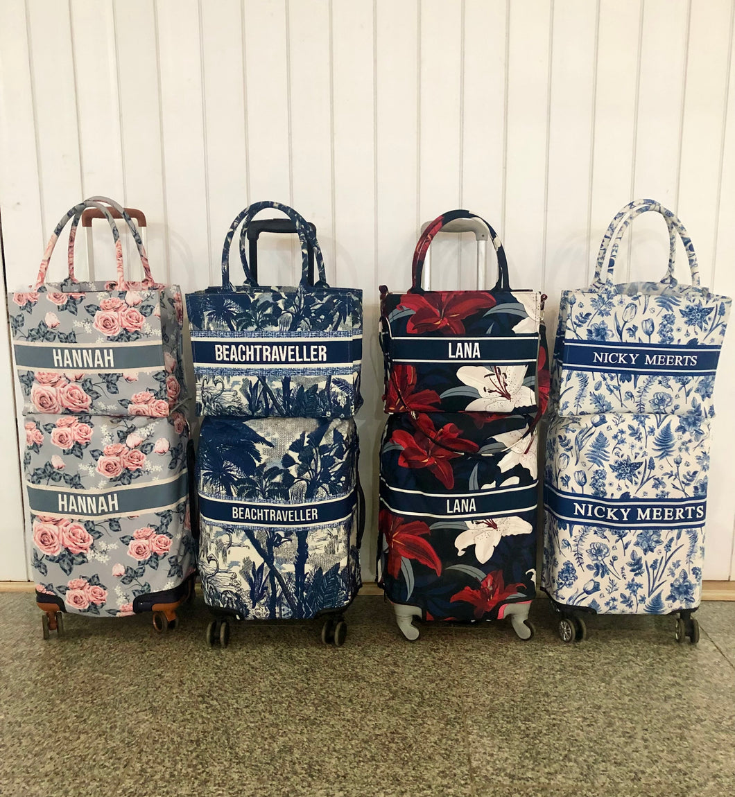 Four colorful travel luggage cover with name options featuring floral and tropical prints from Travellers Hat Boutique