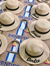 Carregar imagem no visualizador da galeria, Custom embroidered round hat in beige with black band and personalized name embroidery by Travellers Hat Boutique
