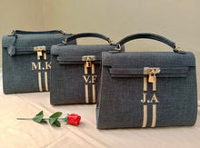 Carregar imagem no visualizador da galeria, Three custom O&#39;Kelly tote bags in dark gray with gold locks and personalized initials by Travellers Hat Boutique
