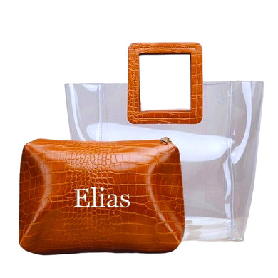 Embroidered clear tote bag with brown faux crocodile handle and matching pouch from Travellers Hat Boutique