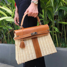 Lade das Bild in den Galerie-Viewer, Handmade wicker purse for women with tan leather trim and top handle tote bag from Travellers Hat Boutique
