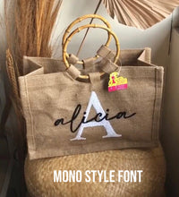 Load image into Gallery viewer, Natural jute tote bag with bamboo handles personalized with name Alicia in mono style font
