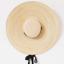 Lade das Bild in den Galerie-Viewer, Large wheat straw hat with wide brim and black tie detail from Travellers Hat Boutique
