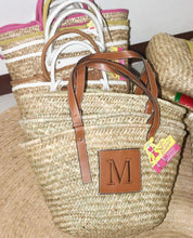 Lade das Bild in den Galerie-Viewer, Seagrass basket handbag tote with brown leather handles and monogrammed patch by Travellers Hat Boutique
