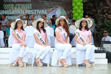 Lade das Bild in den Galerie-Viewer, Women wearing custom floppy hat with pompoms by Travellers Hat Boutique at festival event

