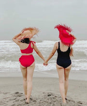 Lade das Bild in den Galerie-Viewer, Two women wearing fringe sun hat for women walking on the beach in red and black swimsuits
