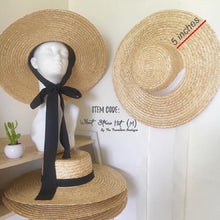 Lade das Bild in den Galerie-Viewer, Wheat straw hat with ribbon featuring a wide 5 inch brim and black bow tie from Travellers Hat Boutique
