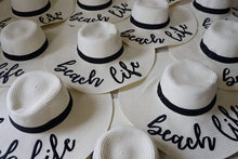 Load image into Gallery viewer, White wholesale floppy sun hats with black bands and beach life embroidery by Travellers Hat Boutique
